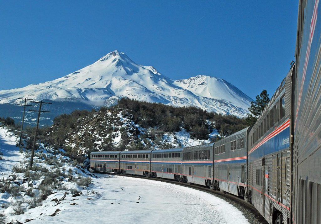 Train among winter mountains