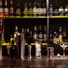 Bar Counter with Glasses and Bartending Tools