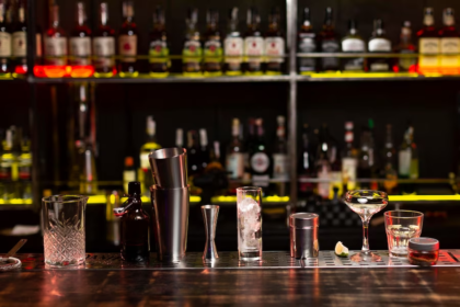 Bar Counter with Glasses and Bartending Tools