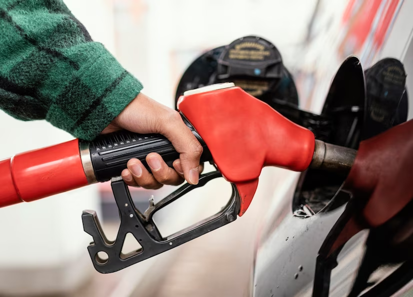 hand gripping a fuel pump